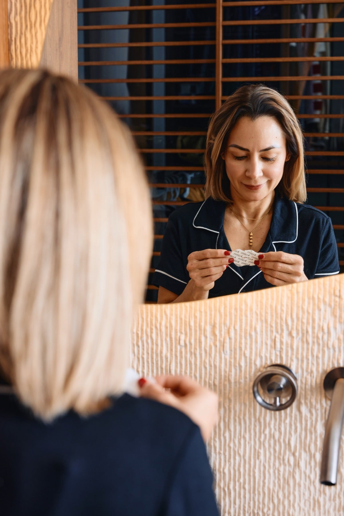 KALM strips and travel capsule arranged as an easy bedside ritual.